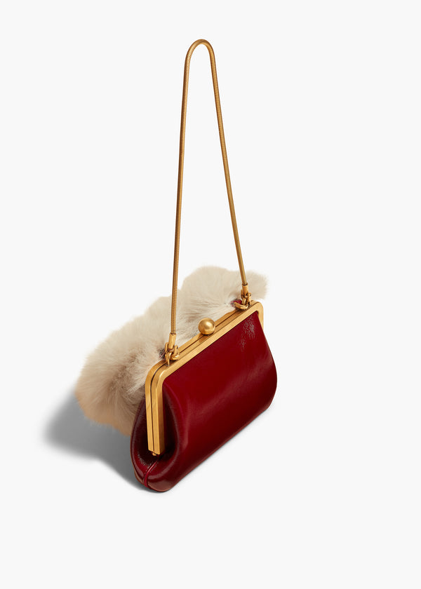 Khaite Small Lilith Evening Bag Oxblood Crackle Patent Leather With Shearling