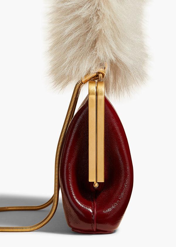 Khaite Small Lilith Evening Bag Oxblood Crackle Patent Leather With Shearling