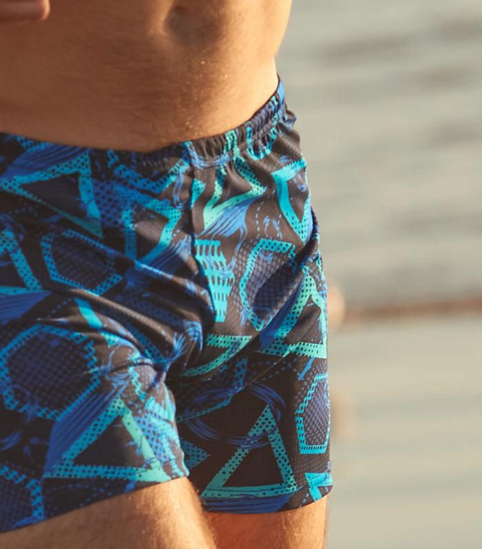 kiniki Blue Lagoon Tan Through Swim Shorts