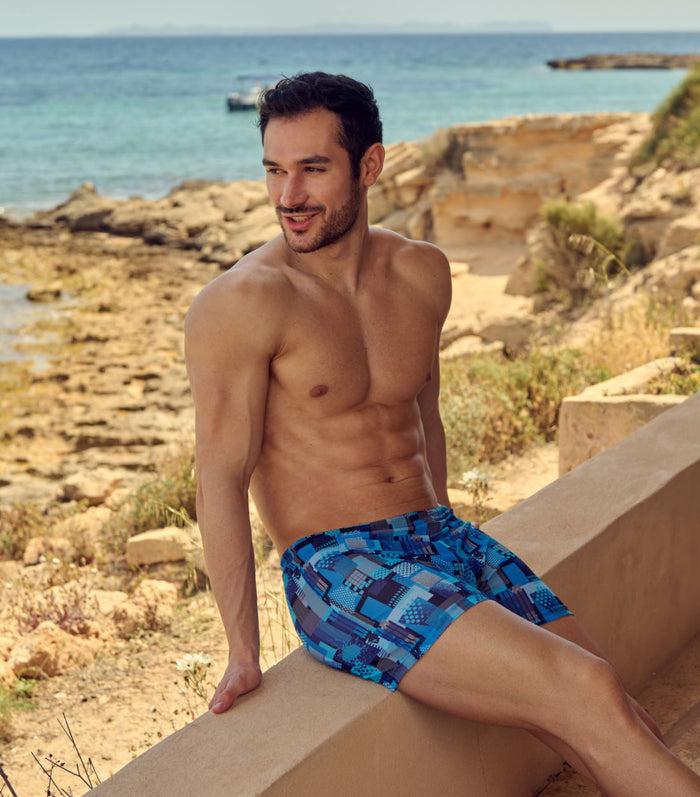 Kiniki Ultramarine Tan Through Swim Shorts