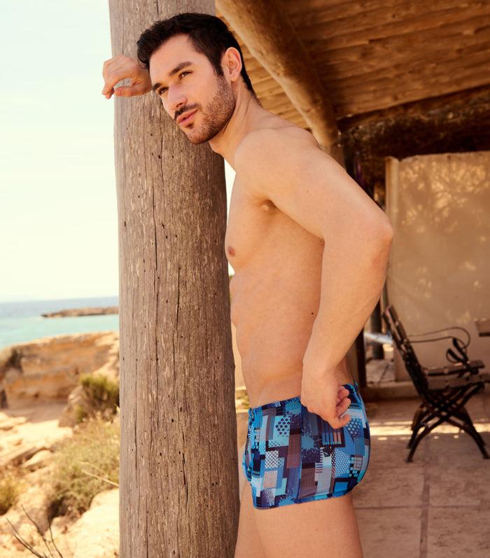 Kiniki Ultramarine Tan Through Swim Trunks