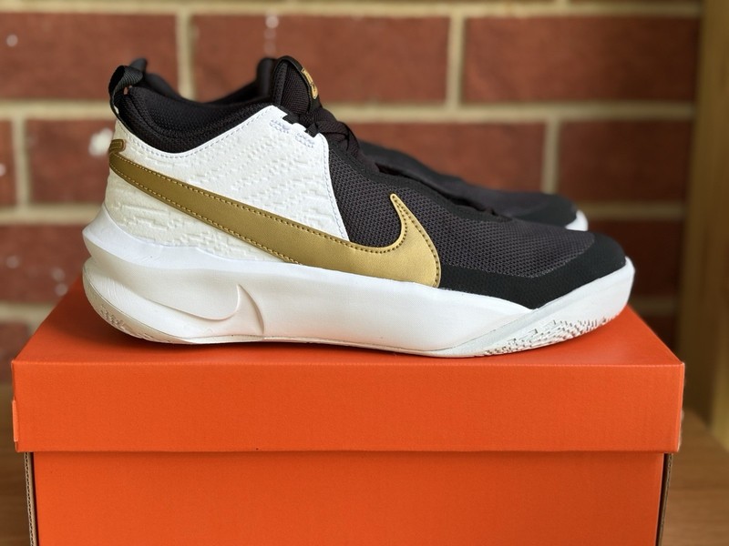 Nike Team Hustle Black White Gold Size 7Y or 8.5 Womens New Sneakers Shoes