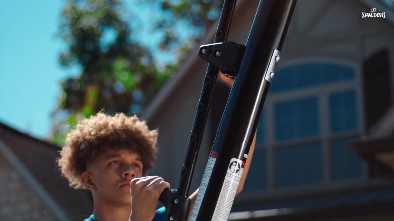 Spalding 54-Inch Portable Basketball Hoop With Shatter-Proof Polycarbonate Backboard Adjustable ExactaHeight System & Pro Slam Rim-Outdoor Play