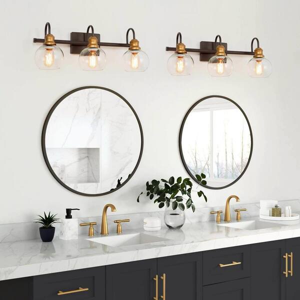 LNC 22.5 In. 3-Light Modern Aged Brass And Black Bathroom Vanity Light With Clear Glass Globe Shades Bathroom Sconce