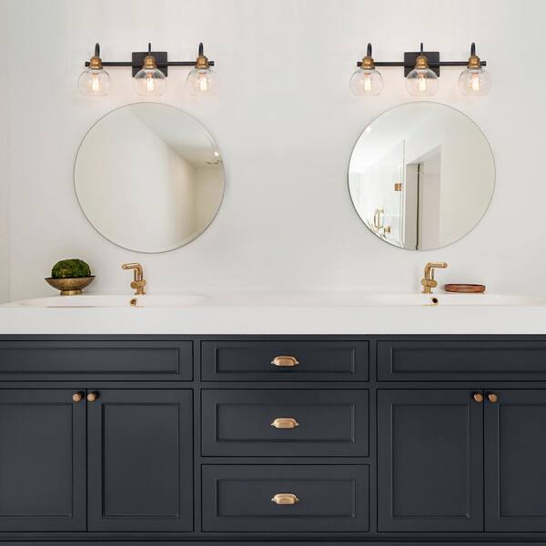 LNC 22.5 In. 3-Light Modern Aged Brass And Black Bathroom Vanity Light With Clear Glass Globe Shades Bathroom Sconce