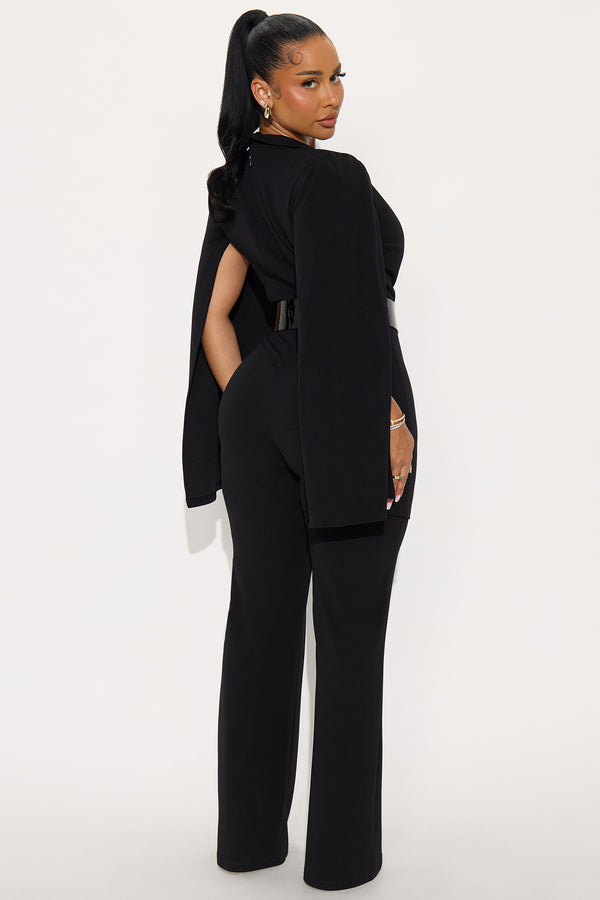 Fashion Nova Ceo Vibes Cape Sleeve Belted Jumpsuit - Black