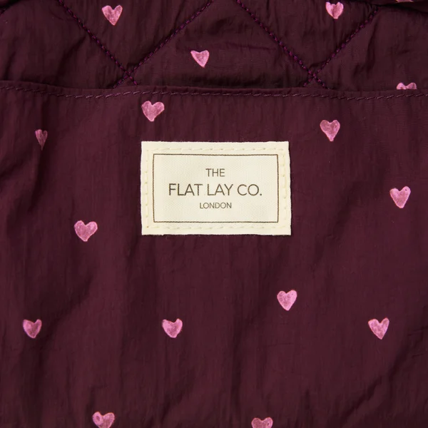 The Flat Lay Co. Parachute Drawstring Flat Lay Makeup Bag - Burgundy Hearts LOOKFANTASTIC EXCLUSIVE