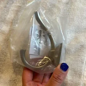 4 Unopened towel hooks from Lowes brushed nickel