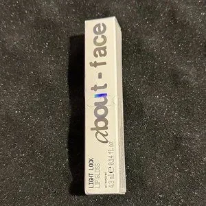 About-Face Light Lock Lip Gloss In Payton