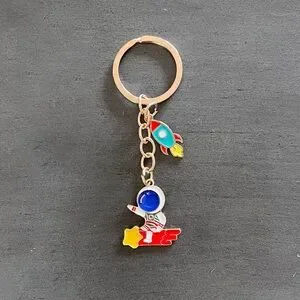 Astronaut Riding Rocket Spaceship Yellow Star Launch Enamel Gold 3.5" Keychain