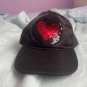 Black cap for women reversible sequin heart. velcro closure. One size