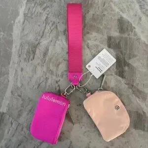 Brand new with tags Lululemon dual pouch keychain