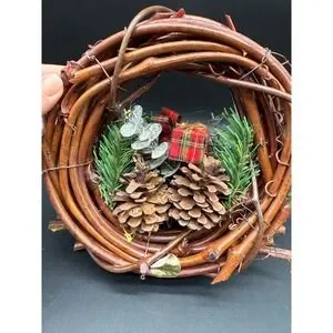 Christmas Wreath With Pinecones Red Apples Berries Tartan Bow And Faux Greens