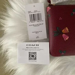 Coach NWT Corner Zip Wristlet With Holiday Bells Print