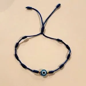 Evil eye bracelet with blue string