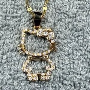 Gold Pendant Necklace with Intricate Design and Gemstones