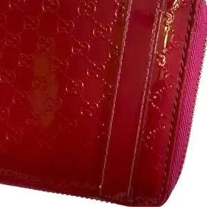 Gucci Pink Patent Leather Zippy Wallet