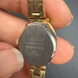 Helbros Ladies Cocktail Watch Gold Tone Bezel Quartz Diamond Sapphire Stones