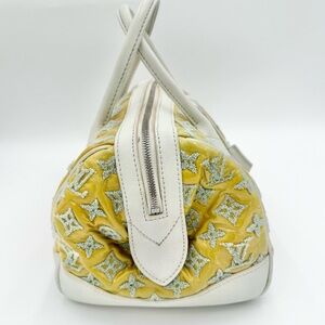 Louis Vuitton Bouclettes Round Perle Speedy. Callouts Is Some Transfer