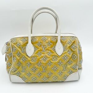 Louis Vuitton Bouclettes Round Perle Speedy. Callouts Is Some Transfer
