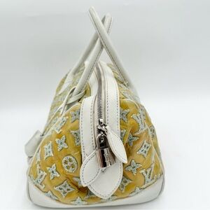 Louis Vuitton Bouclettes Round Perle Speedy. Callouts Is Some Transfer