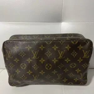 Louis Vuitton Monogram Toiletry Bag In Brown And Gold
