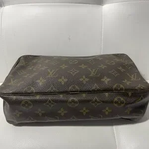 Louis Vuitton Monogram Toiletry Bag In Brown And Gold