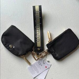 Lululemon Everywhere Crossbody Belt Bag Wordmark Black And Gold Logo