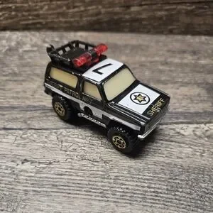 Matchbox Mega Blasters Cap Car Chevy K5 Blazer Sheriff Patrol Police Black
