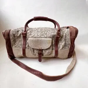 Myra bag Floral prints canvas hair-on leather weekender bag