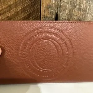 New Orton Brown Pebbled Leather Zip Around Wallet With Embossed Logo 16 Card