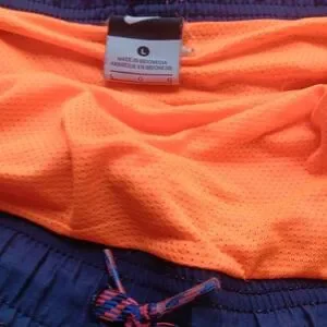 NIKE SIZE LARGE BLUE AND ORANGE ATHLETIC SHORTS