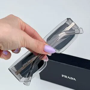 Prada PR06YS 12R09T Transparent Grey Dark Grey Rectangle Unisex