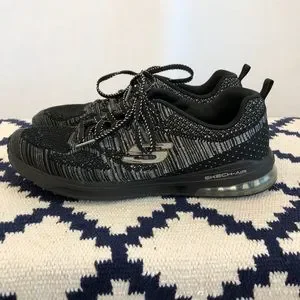 Sketchers black and metallic tennis shoes size 10