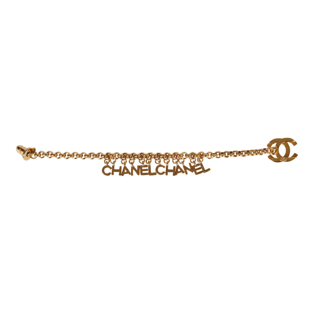 Vintage Chanel 24K Gold Plated "Chanel" Logo Charms Turnlock Bracelet