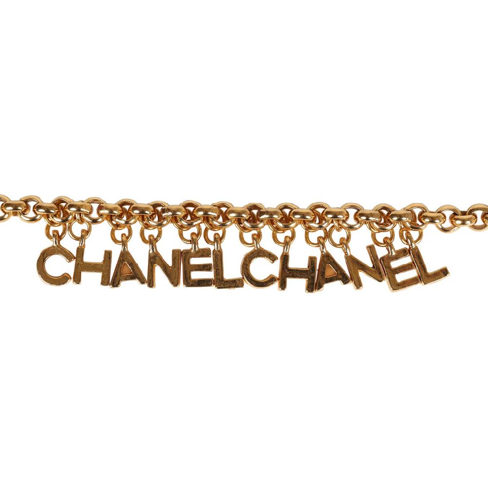 Vintage Chanel 24K Gold Plated "Chanel" Logo Charms Turnlock Bracelet