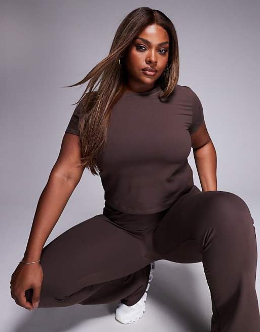 4505 Curve Icon soft touch studio baby t-shirt in plum chocolate