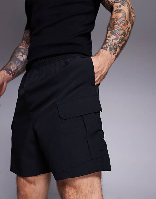 4505 Icon 7 Inch Quick Dry Training Cargo Shorts With Zip Pockets In Black
