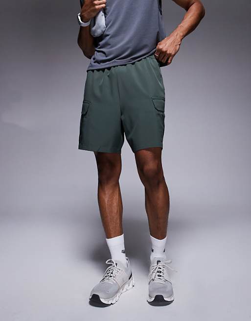 4505 Icon 7 Inch Quick Dry Training Cargo Shorts With Zip Pockets In Deep Khaki