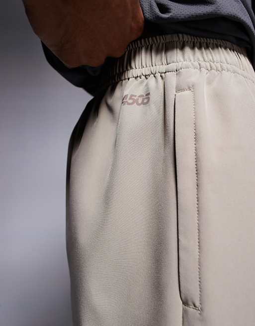 4505 Icon 7 Inch Quick Dry Training Shorts With Zip Pockets In Stone