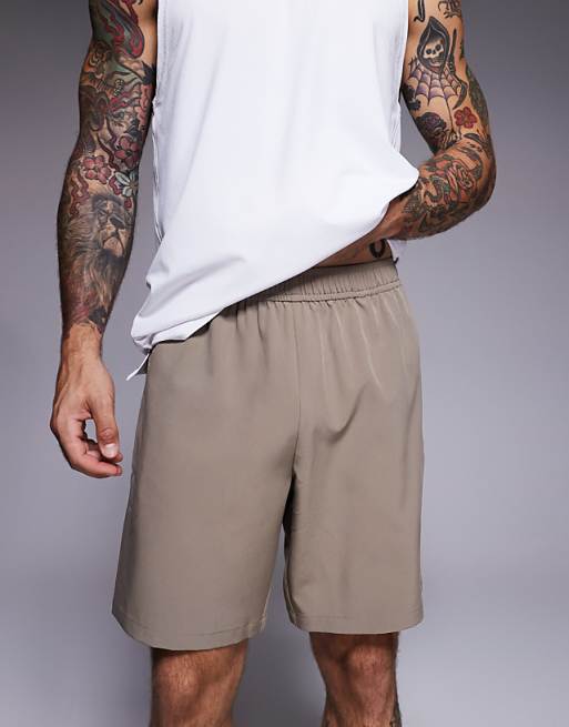 4505 Icon 7 Inch Quick Dry Training Shorts With Zip Pockets In Stone Grey