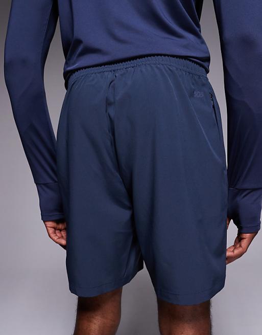 4505 Icon 7 Inch Quick Dry Training Shorts With Zip Pockets In Deep Navy