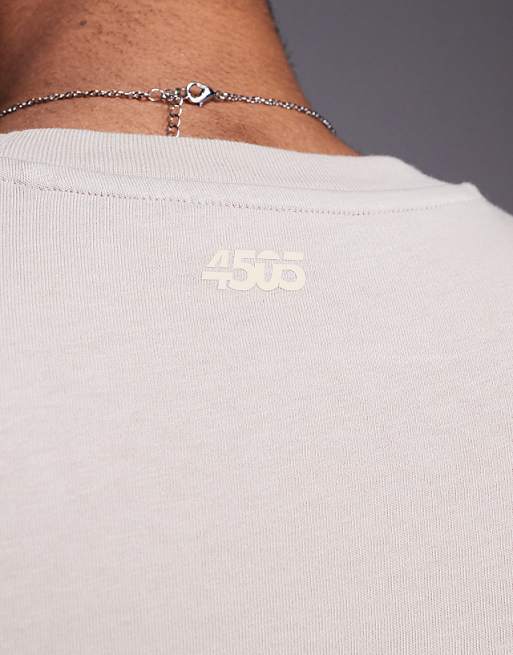 4505 Icon Cotton Oversized Pump Training Tank With Quick Dry Finish In Washed Stone