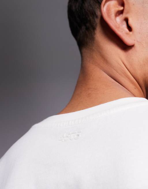 4505 Icon Cotton Oversized Pump Training Tank With Quick Dry Finish In Off White