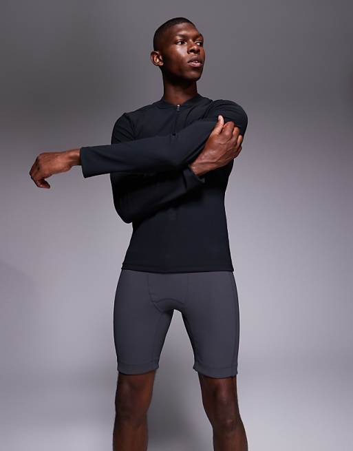 4505 running base layer ribbed legging shorts with phone pocket in charcoal