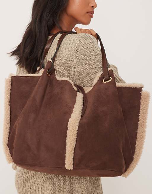 Accessorize Shearling And Faux Suede Reversible Shoulder Bag In Brown