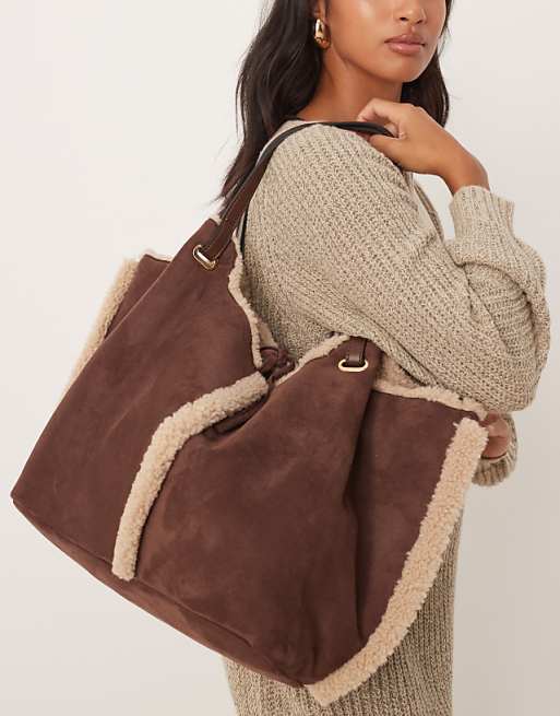 Accessorize shearling and faux suede reversible shoulder bag in brown
