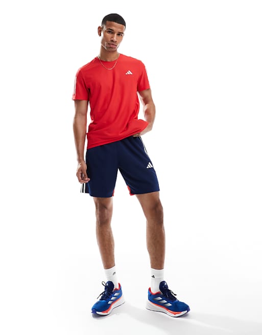 adidas Football Tiro essentials shorts in navy and red