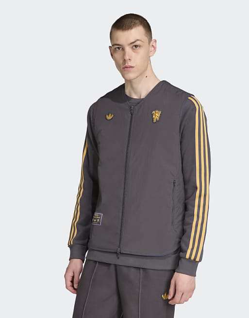 adidas Originals Manchester united terrace icons vest in utility black / semi night fla