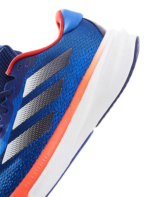 Adidas Running Supernova Stride Trainers In Navy And Orange